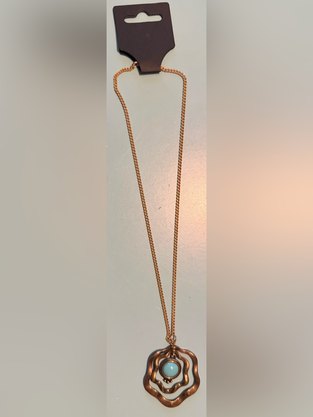 Gold-Tone Floral Pendant Necklace with Turquoise Stone